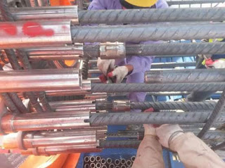 Pile Cage Main bars being Welded Pile Cage Main bars being Welded